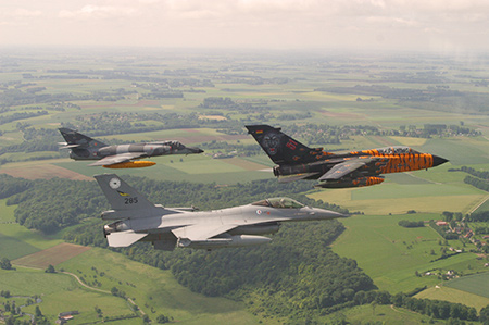 An AG-51 Tornado, tasked for aerial reconnaisance leads the formation in one of the COMAO missions during NTM 2003.