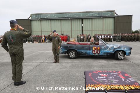 51 Wing Commander Colonel Jörg Schroeder (middle) receives report during Opening Ceremony