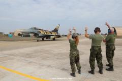 Czech crew chiefs showing their claws to taxiing aircraft.